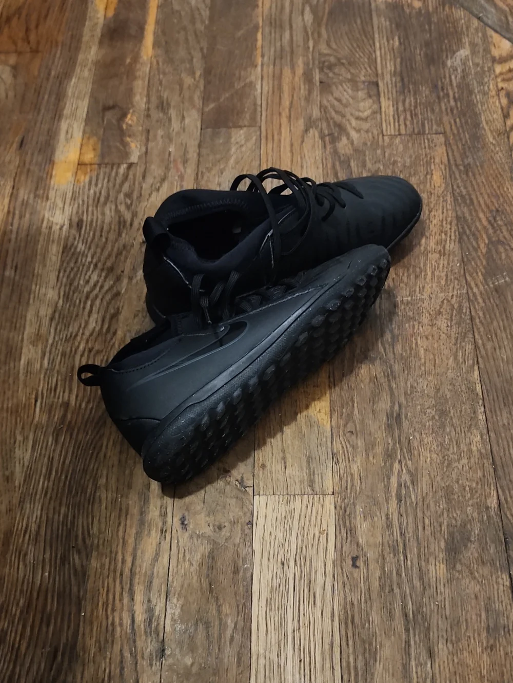Black Nike Phantom Luna 2 high-top soccer sneakers